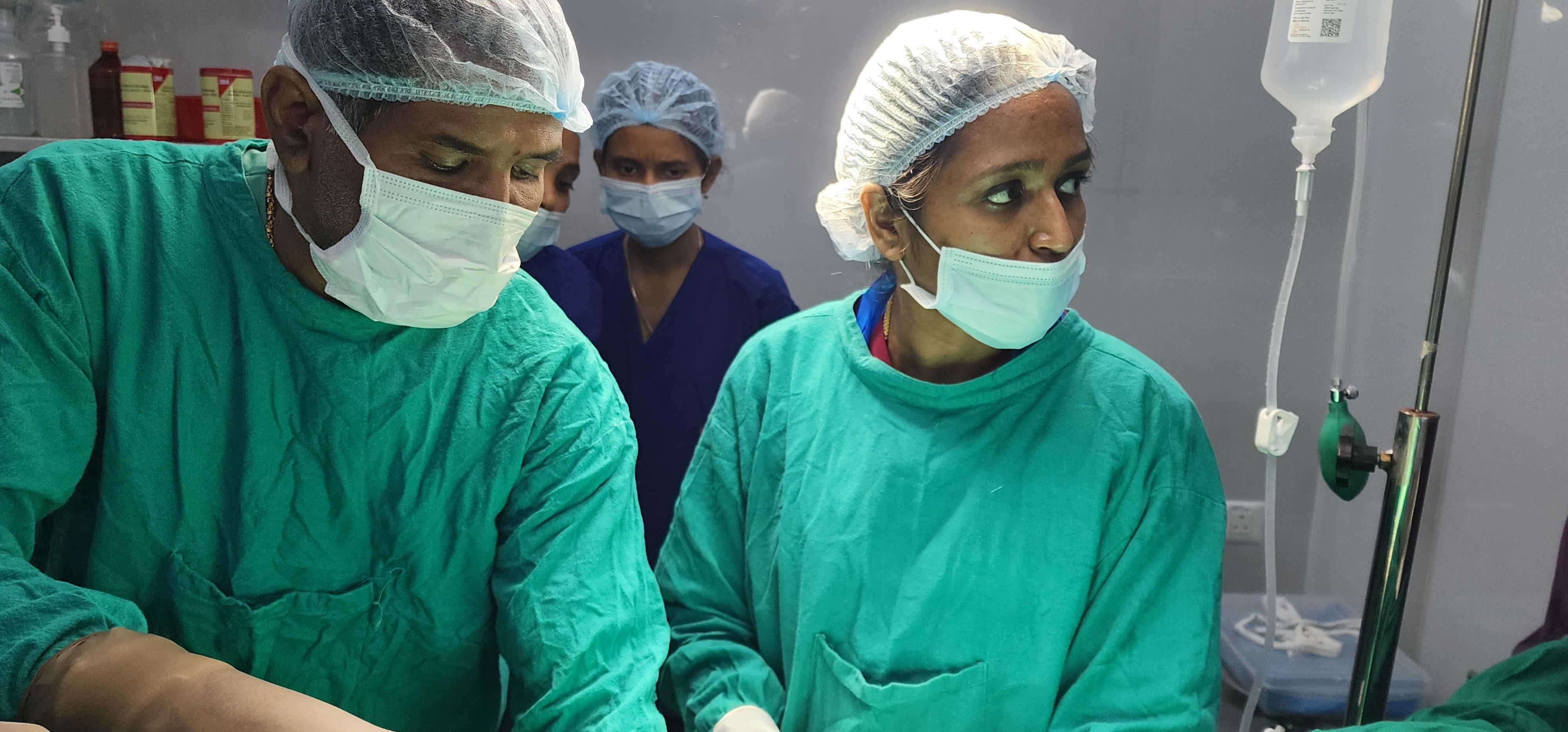 Surgical team at GarbhaGruha Health Center Bangalore during a laparoscopic procedure