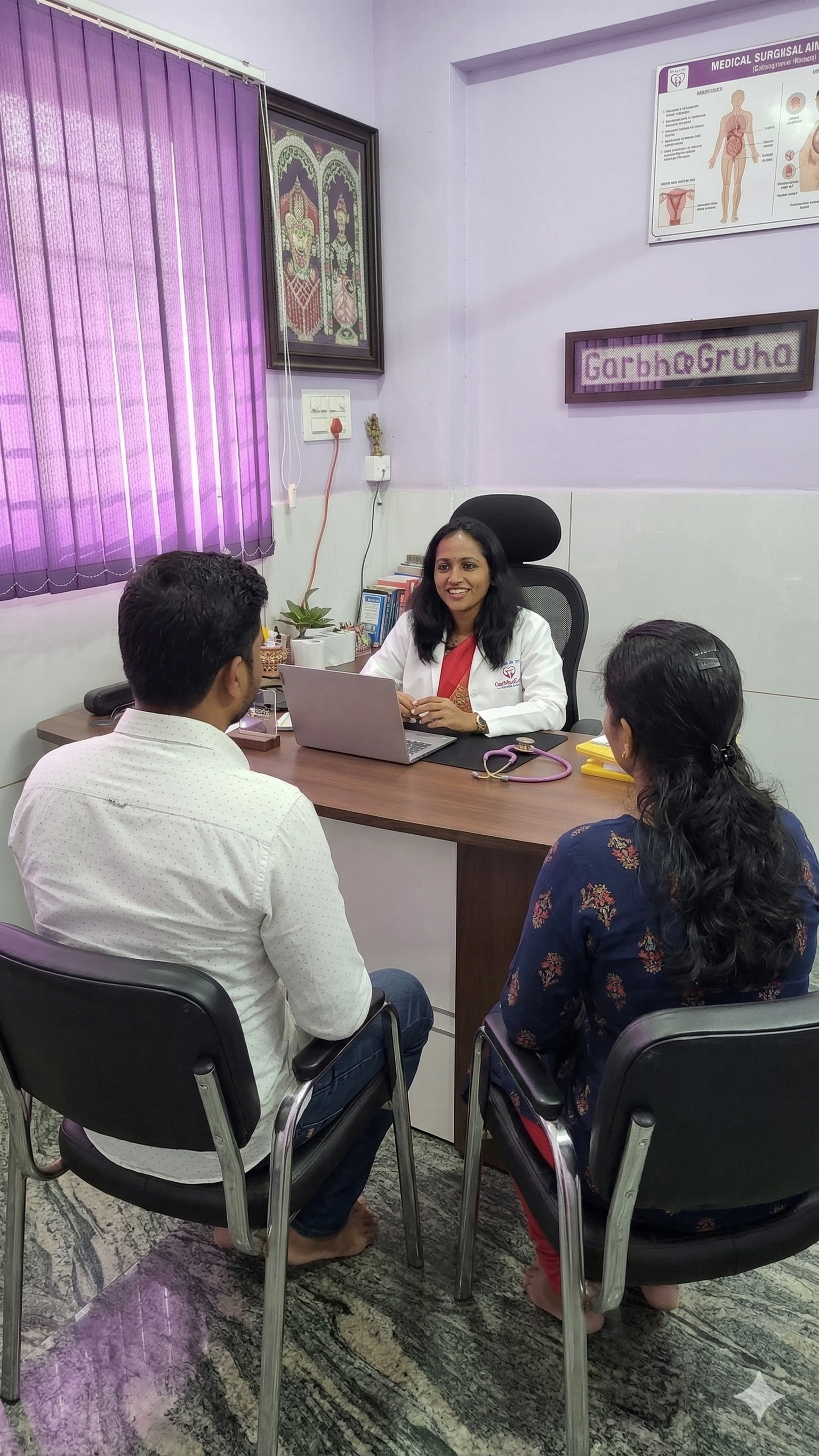 Dr. Rashmi T N consulting a couple about fertility and IVF treatment at GarbhaGruha Health Center